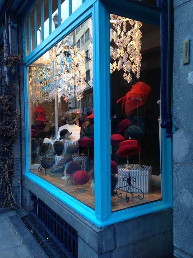Just got out of the car here and just love the cute hat shop.  Yay colors! 